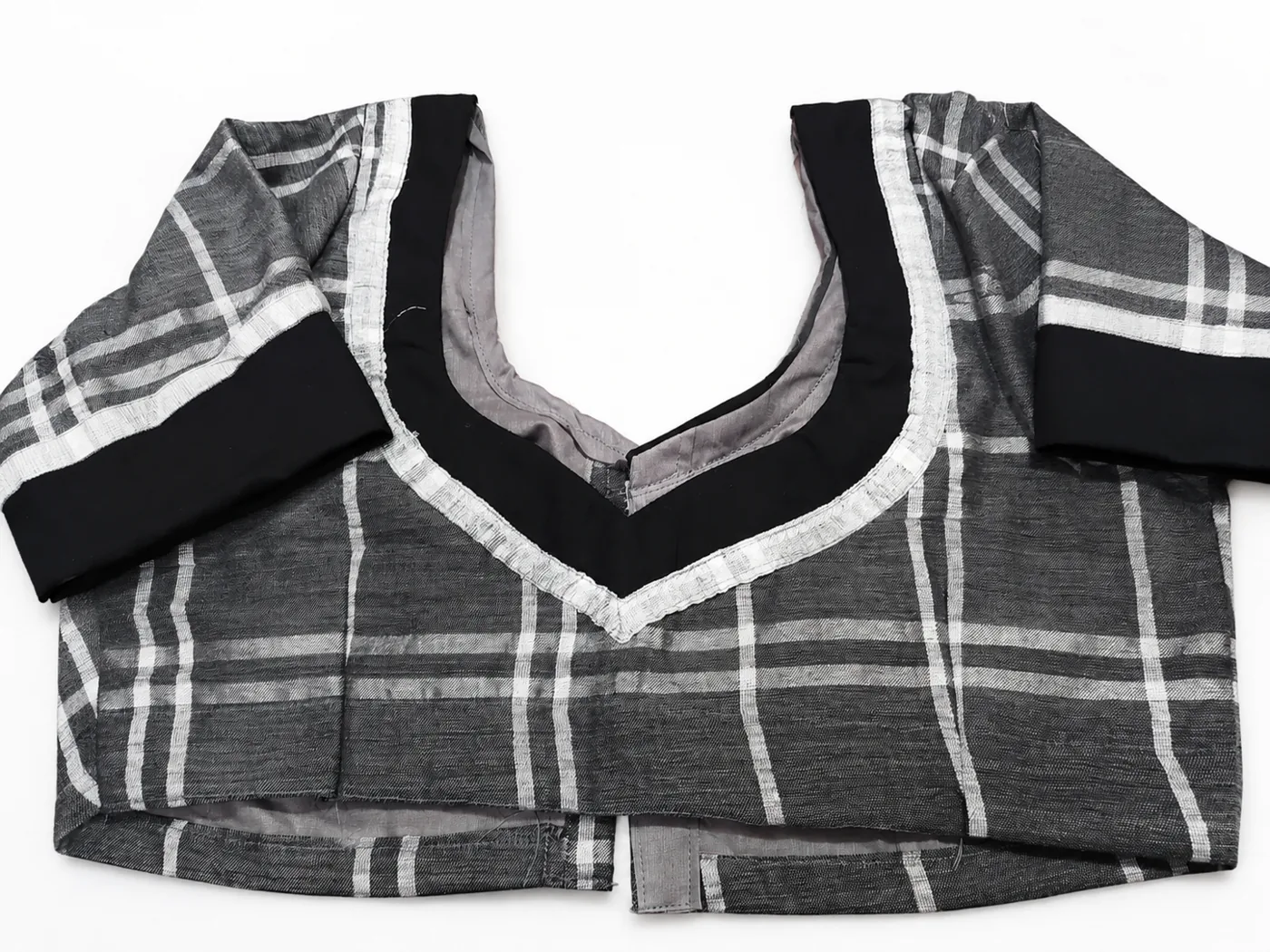 Black and white checked designer blouse with solid black borders