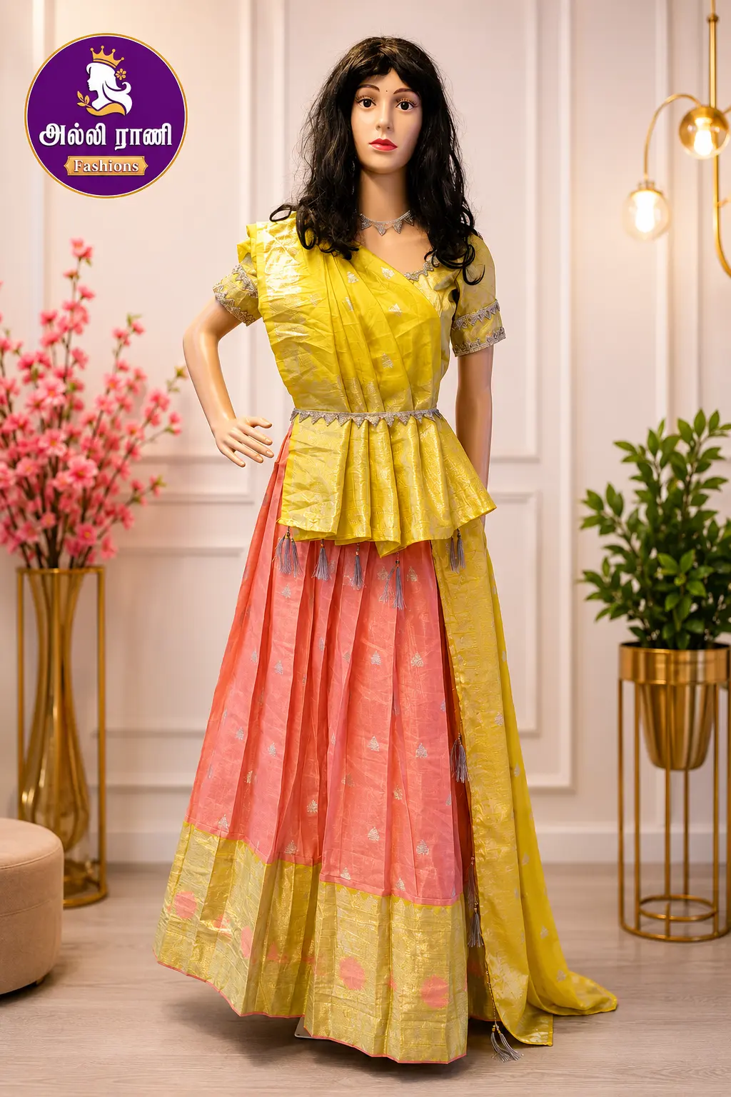 Lemon yellow and coral half saree displayed on a mannequin