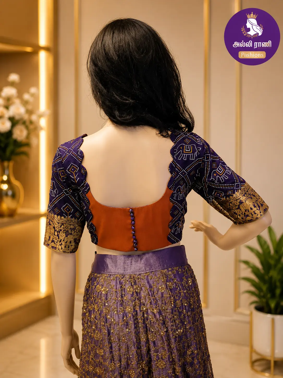 Rear view of a purple bandhani blouse showing the back design